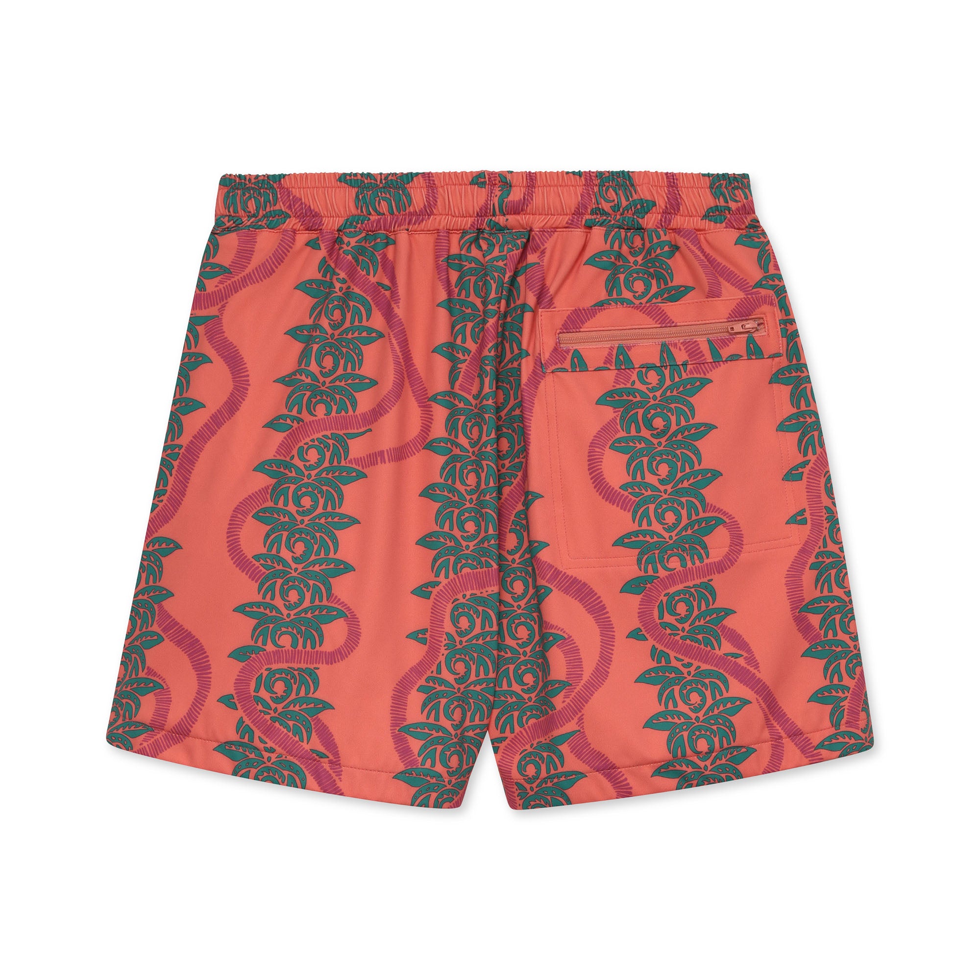 Pink shorts with green leaf pattern on a white background.
