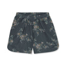 Floral-patterned shorts on a white background