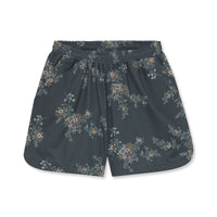 Floral-patterned shorts on a white background