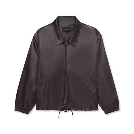 Iridescent purple jacket with double zippers and an adjustable black drawstring, displayed against a white background.
