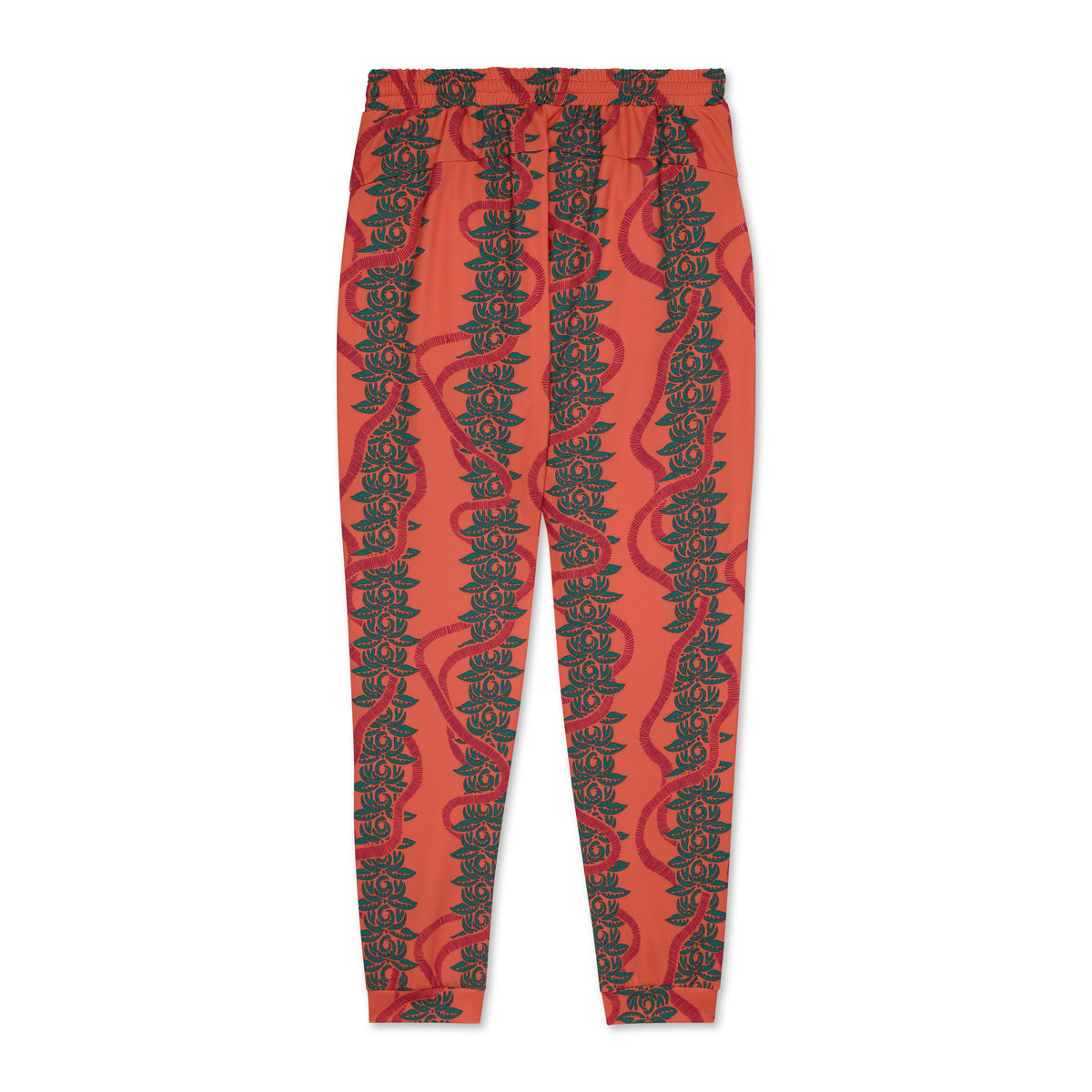Pink jogger pants with green leaf pattern on a white background