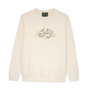 Cream sweatshirt with floral design and text on a white background 