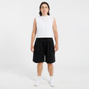 Person wearing a white tank top and black Bermuda shorts on a white background.