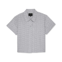 Short-sleeve button-down shirt with a subtle white leaf pattern on a white background.