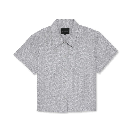 Short-sleeve button-down shirt with a subtle white leaf pattern on a white background.