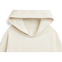 Natural, off-white hoodie detail on a white background